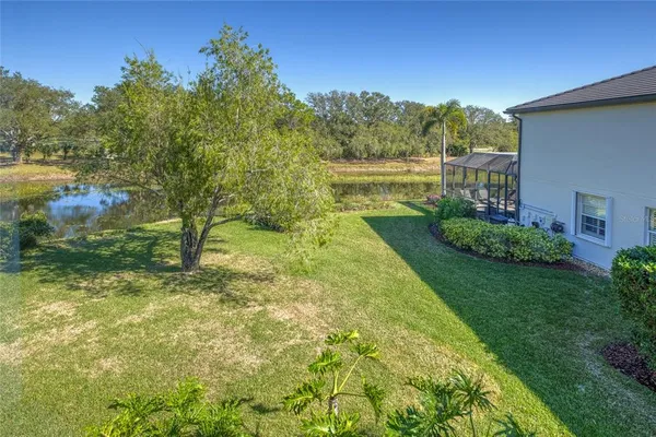 a view of a garden with a lake
