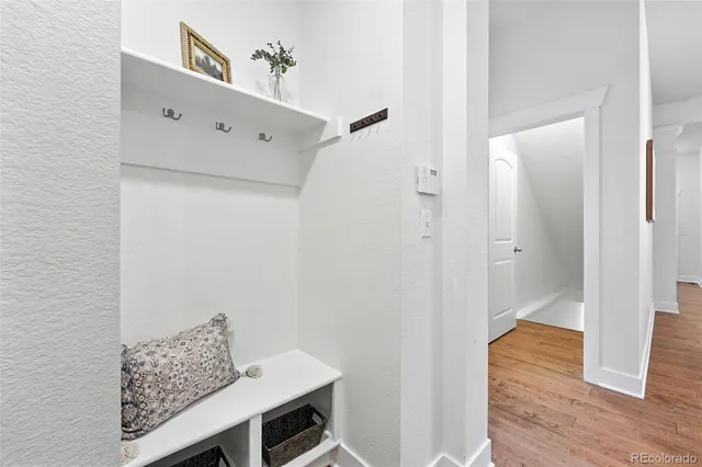 a view of kitchen with wooden floor