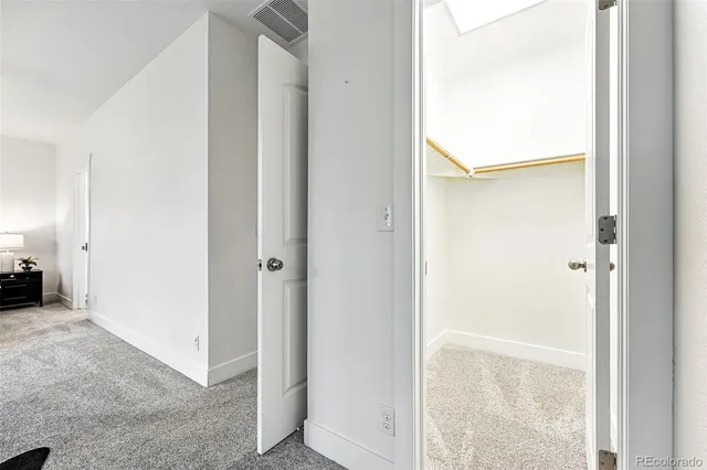 a view of a room that has a large window