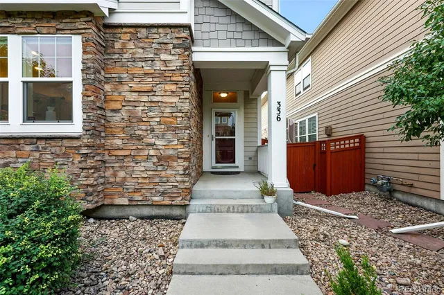 a view of entrance gate of a house