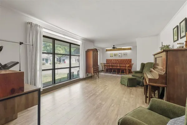 a living room with furniture and a window