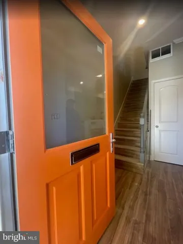 a bathroom with a sink a toilet and bathtub