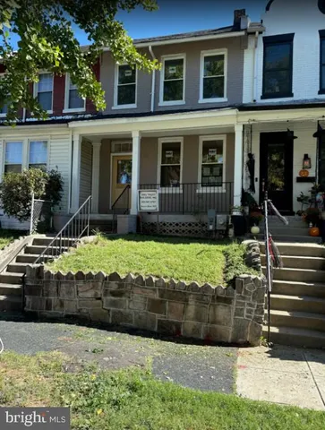 a view of balcony with wooden floor
