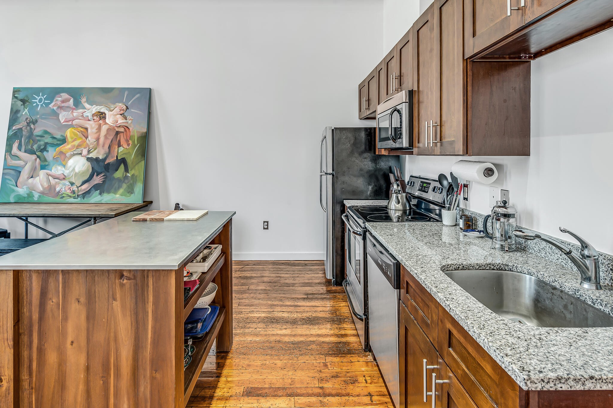 1350 Rosa L Parks Boulevard, Unit 338 Nashville, TN 37208 - Photo 12 of 28 a kitchen with a sink stove and microwave