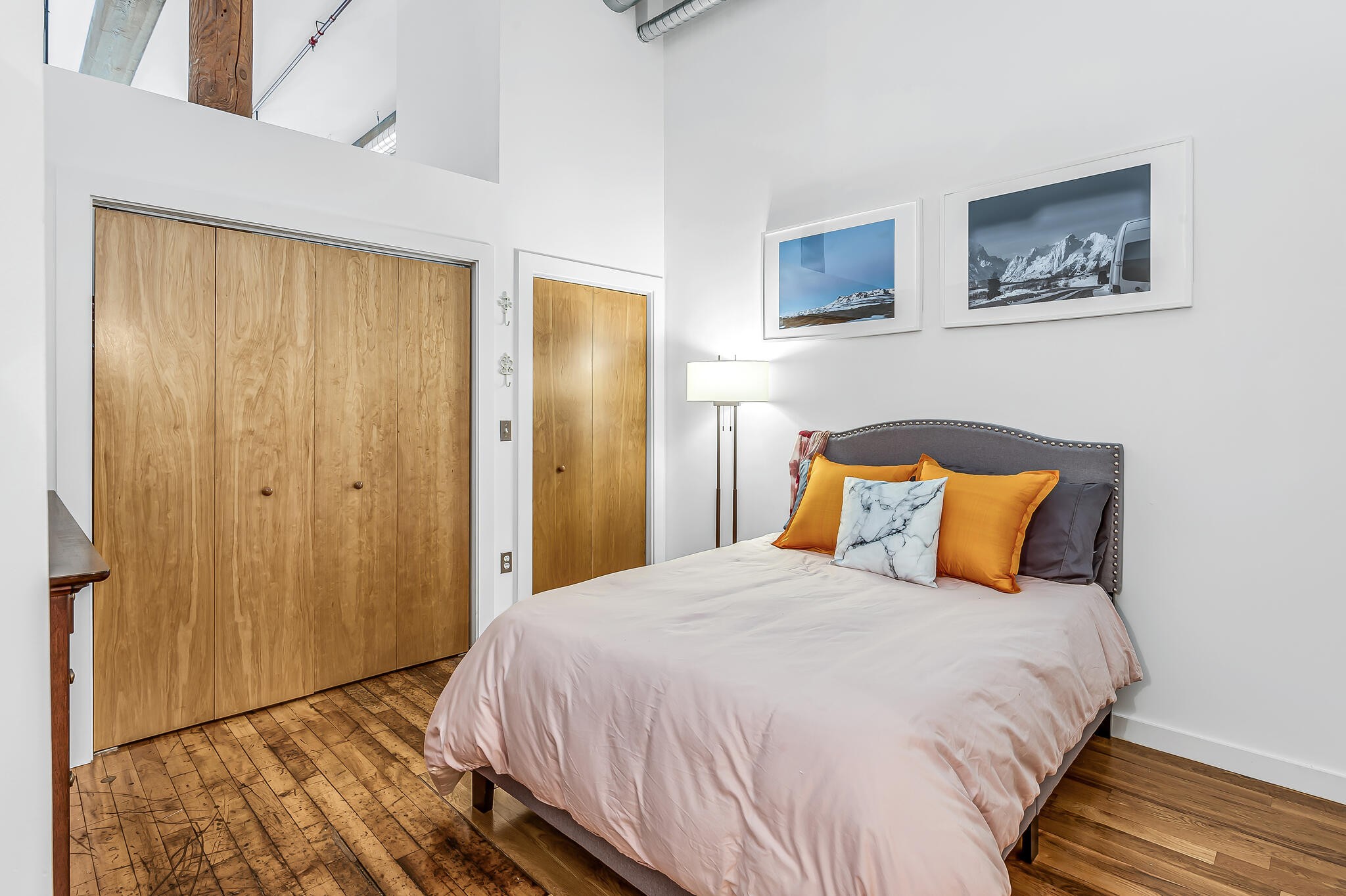 1350 Rosa L Parks Boulevard, Unit 338 Nashville, TN 37208 - Photo 15 of 28 a bedroom with a bed and wooden floor