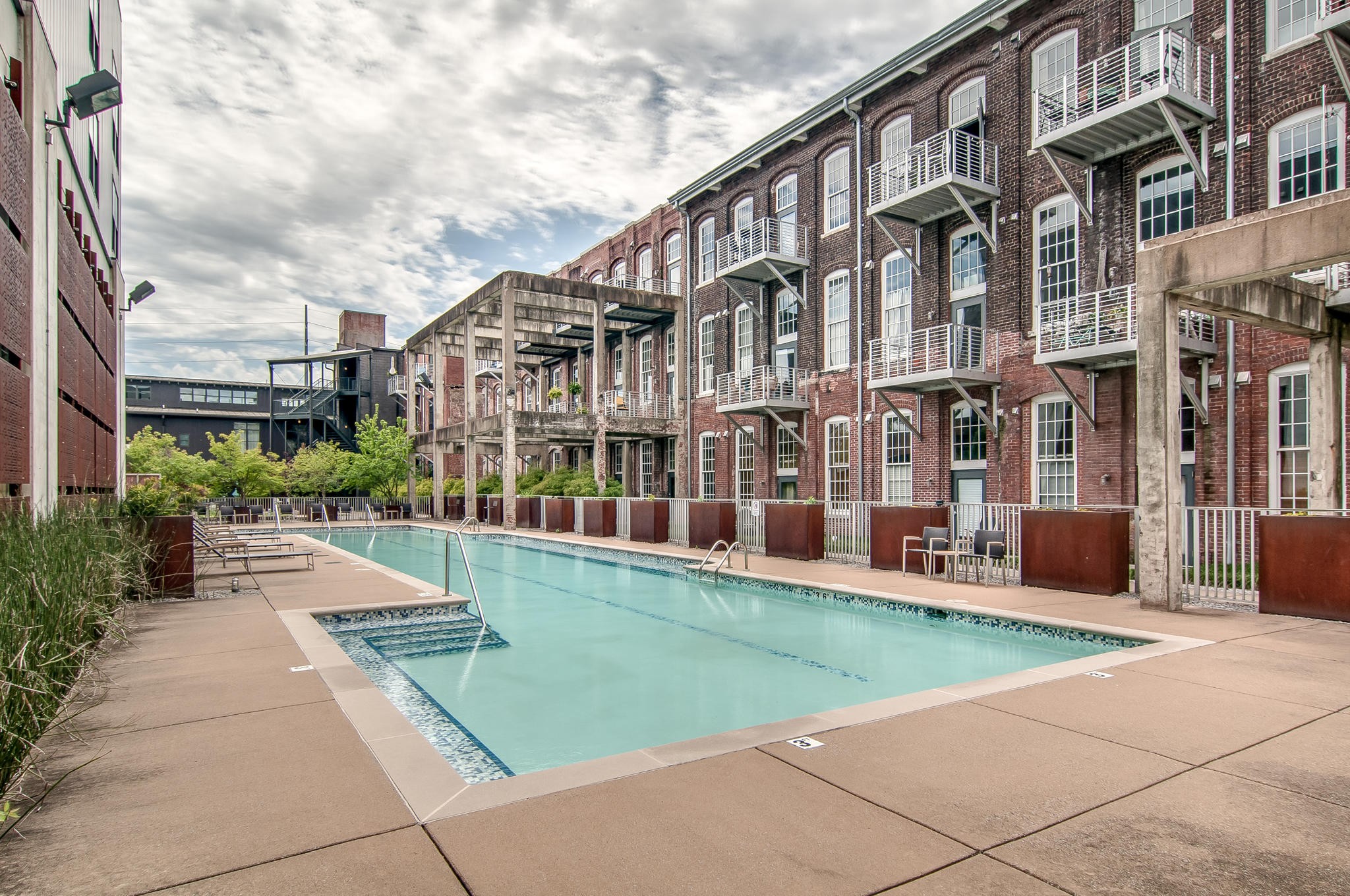 1350 Rosa L Parks Boulevard, Unit 338 Nashville, TN 37208 - Photo 20 of 28 a view of a building with a yard