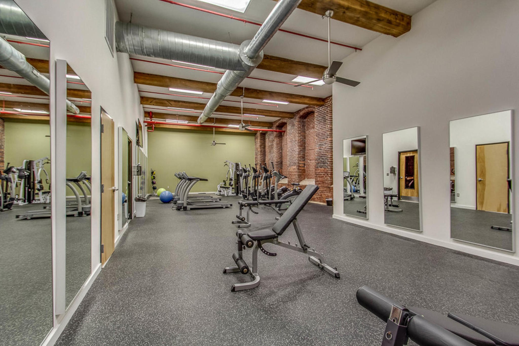 1350 Rosa L Parks Boulevard, Unit 338 Nashville, TN 37208 - Photo 23 of 28 a view of a room with gym equipment