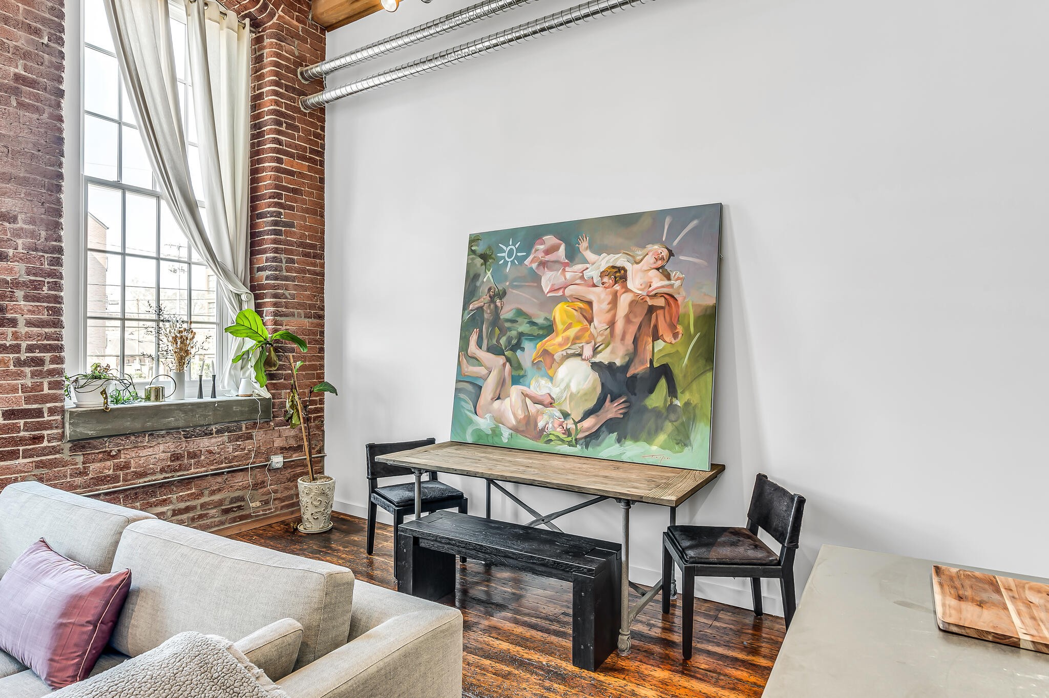 1350 Rosa L Parks Boulevard, Unit 338 Nashville, TN 37208 - Photo 8 of 28 a living room with furniture and a window