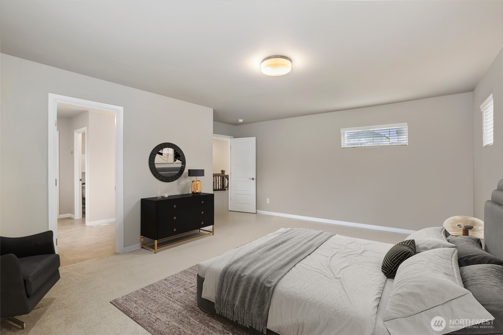 25704 207th Place Southeast Covington, WA 98042 - Photo 15 of 34 a bedroom with a bed and couch