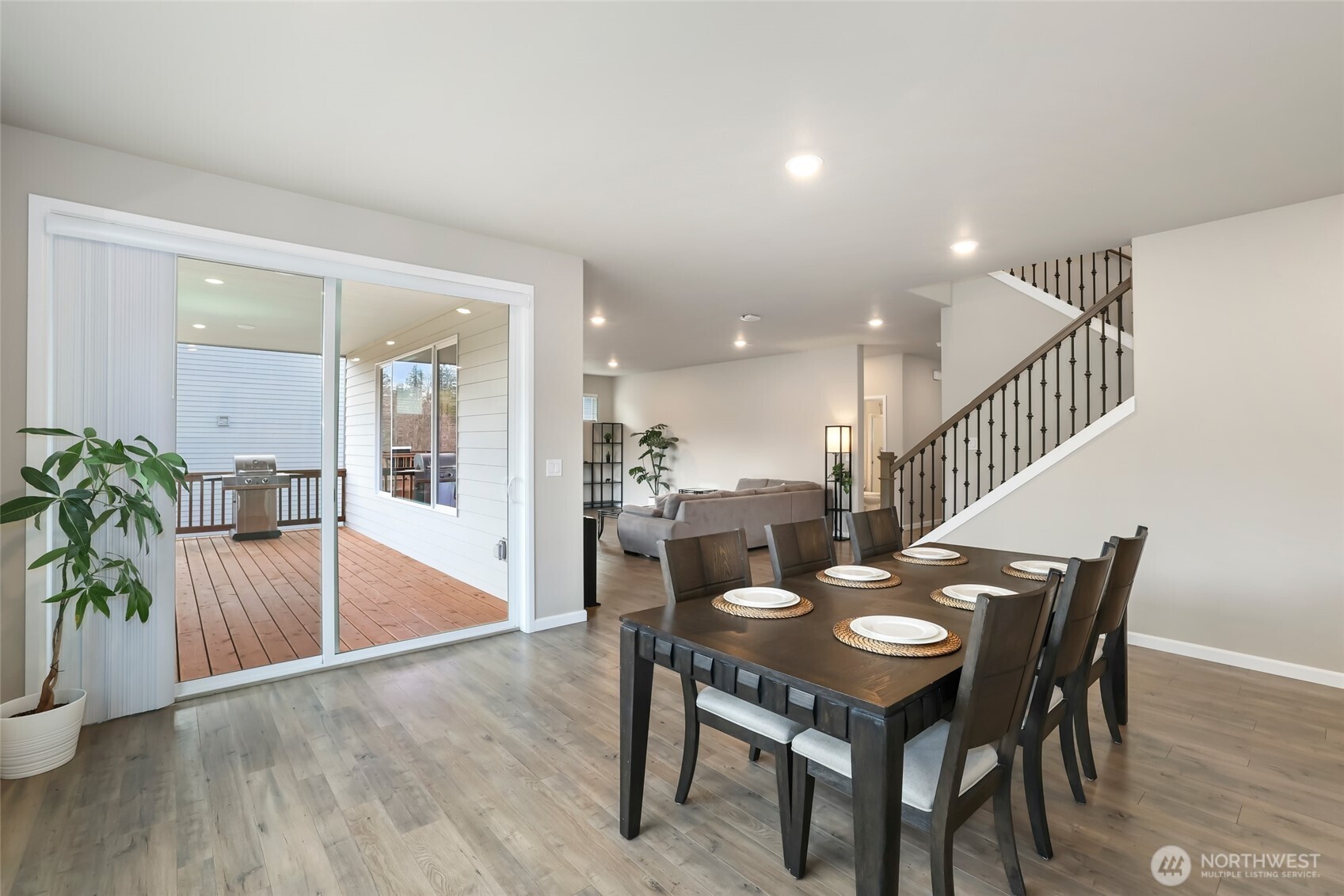 25704 207th Place Southeast Covington, WA 98042 - Photo 5 of 34 a dining room with furniture and wooden floor