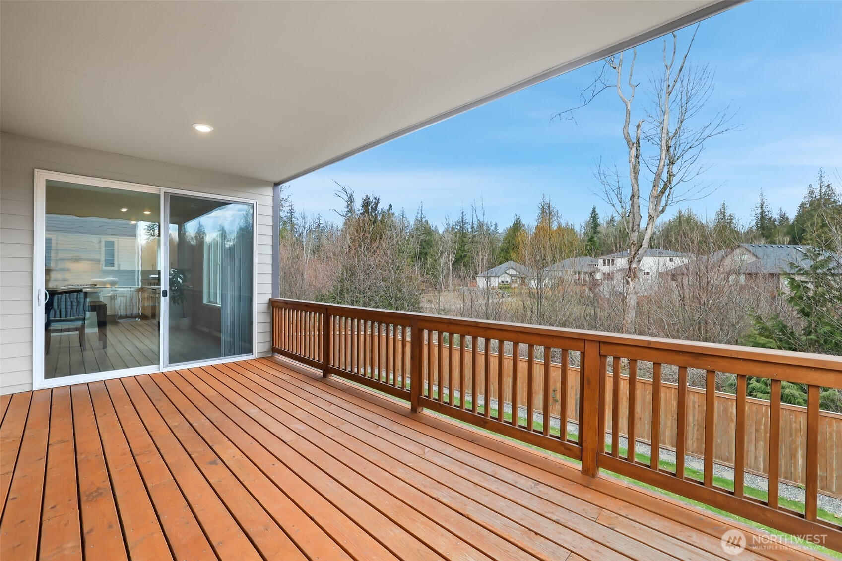 25704 207th Place Southeast Covington, WA 98042 - Photo 6 of 34 a view of balcony with wooden floor and fence