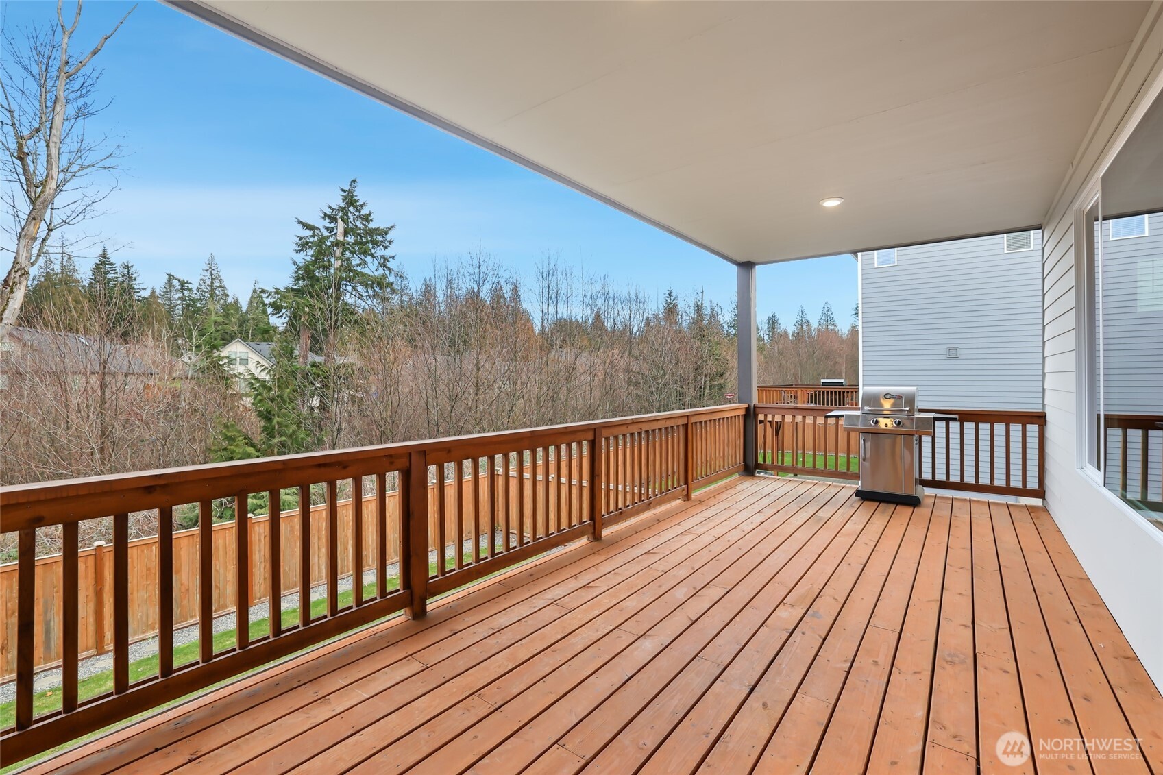 25704 207th Place Southeast Covington, WA 98042 - Photo 7 of 34 a view of balcony with wooden floor and fence