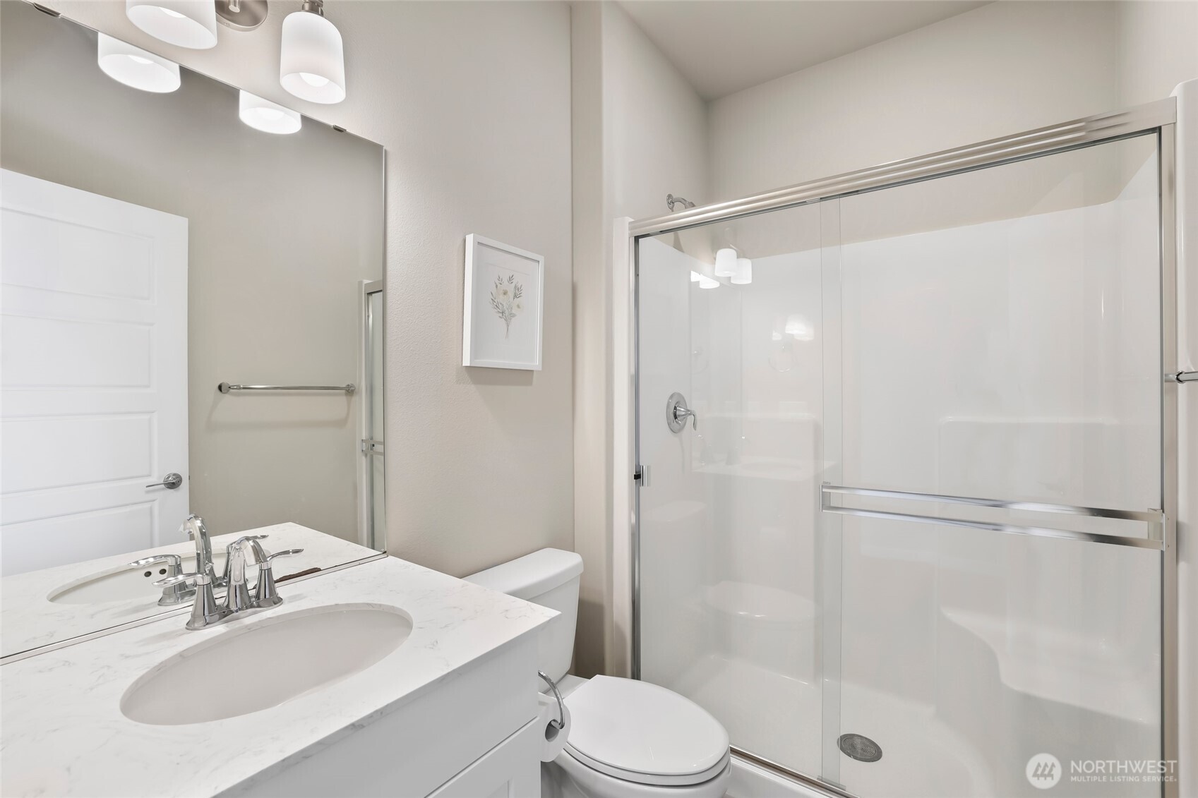 25704 207th Place Southeast Covington, WA 98042 - Photo 10 of 34 a bathroom with a sink toilet and shower