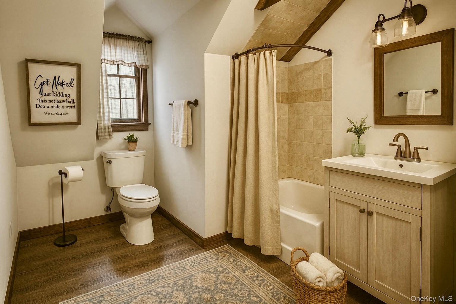 241 White Bridge Road Middletown, NY 10940 - Photo 25 of 29 AI Generated Bathroom with vanity, shower / bathtub combination with curtain, lofted ceiling, and dark wood-style flooring
