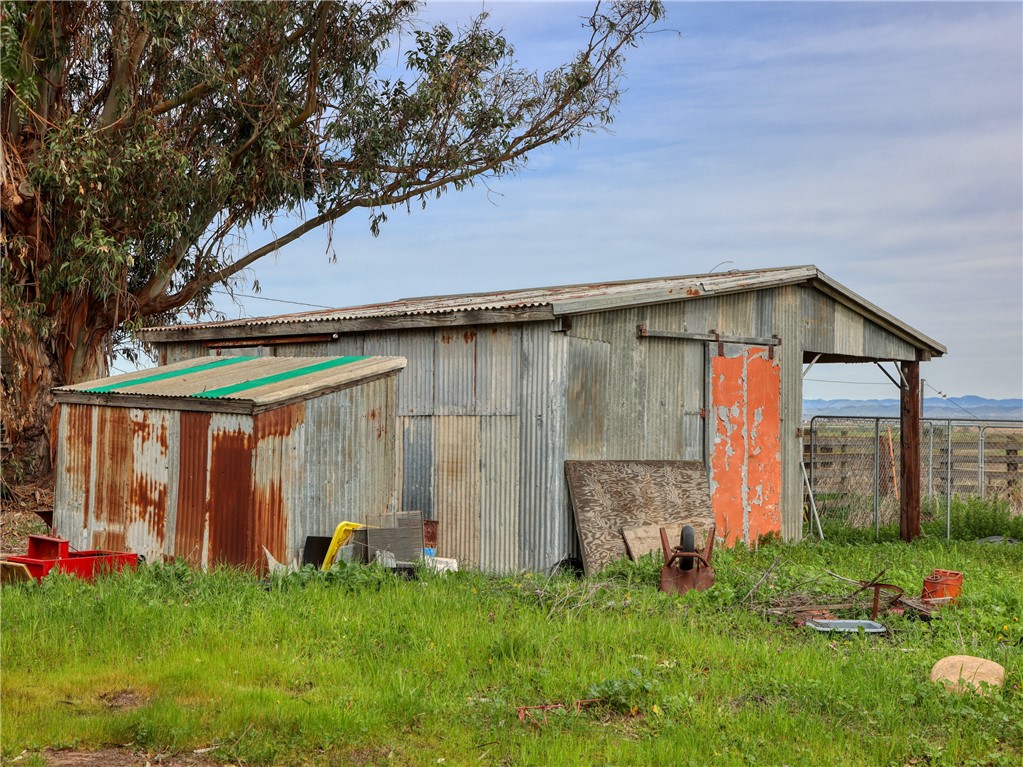 31 Cabrillo Highway Santa Maria, CA 93455 - Photo 11 of 44 a backyard of a house with barbeque oven table and chairs