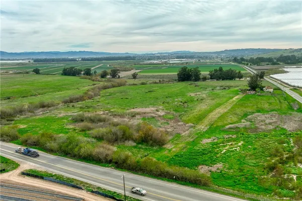 a view of a lake with a big yard