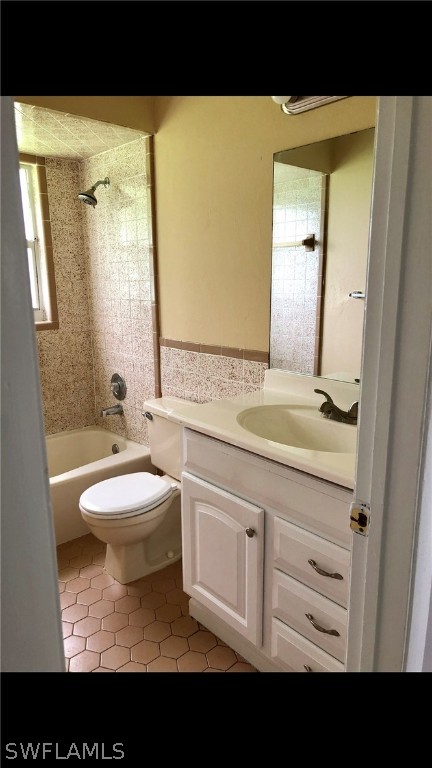 19076 Coconut Road Fort Myers, FL 33967 - Photo 5 of 8 a bathroom with a sink and a mirror