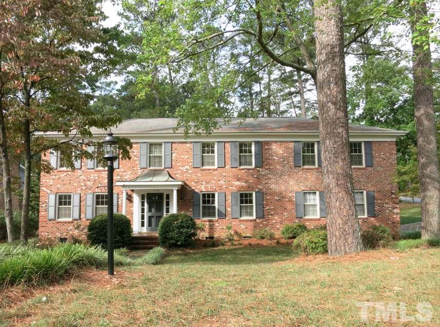 1120 Country Ridge Drive Raleigh, NC 27609 - Photo 1 of 25 SPACIOUS 5BR/3.5BA/3139sf 2-story in Midtown's Quail Hollow w/pool & tennis available! Near shops/dining/Eastgate Park/I-440! All brick home on lg wooded, landscaped corner lot w/big Patio & attached side-load 2-car Garage.