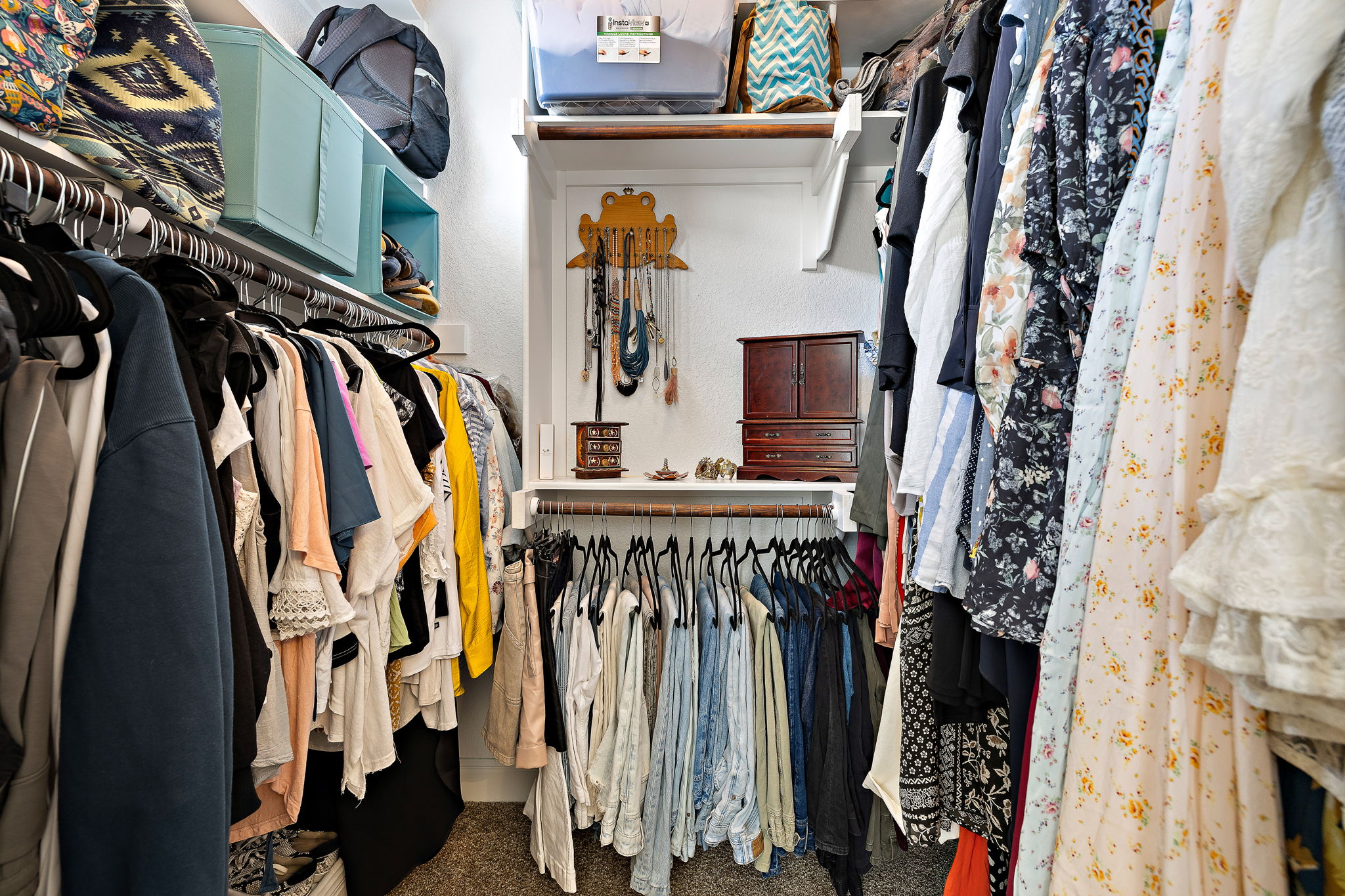 6708 Menchaca Road, Unit 10 Austin, TX 78745 - Photo 21 of 30 Primary closet maximizes storage and organization.