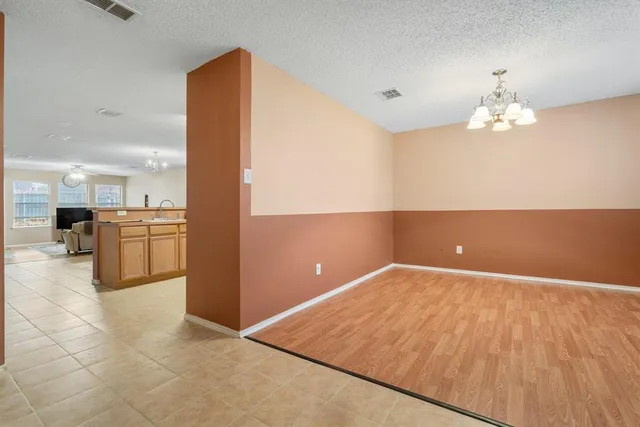 a view of a livingroom with a kitchen