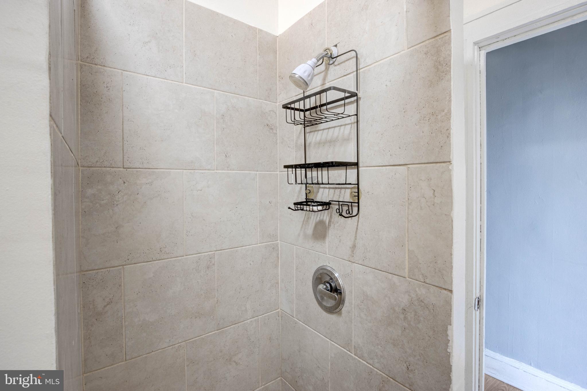 3438 Belair Road Baltimore, MD 21213 - Photo 25 of 36 a bathroom with a shower