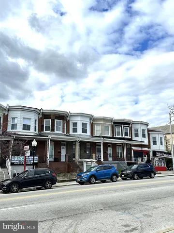 a view of a car park in front of a building