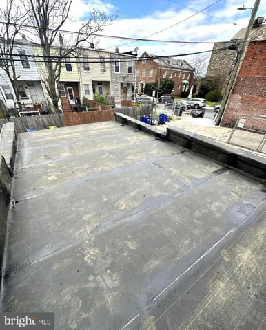 a view of parking with cars parked