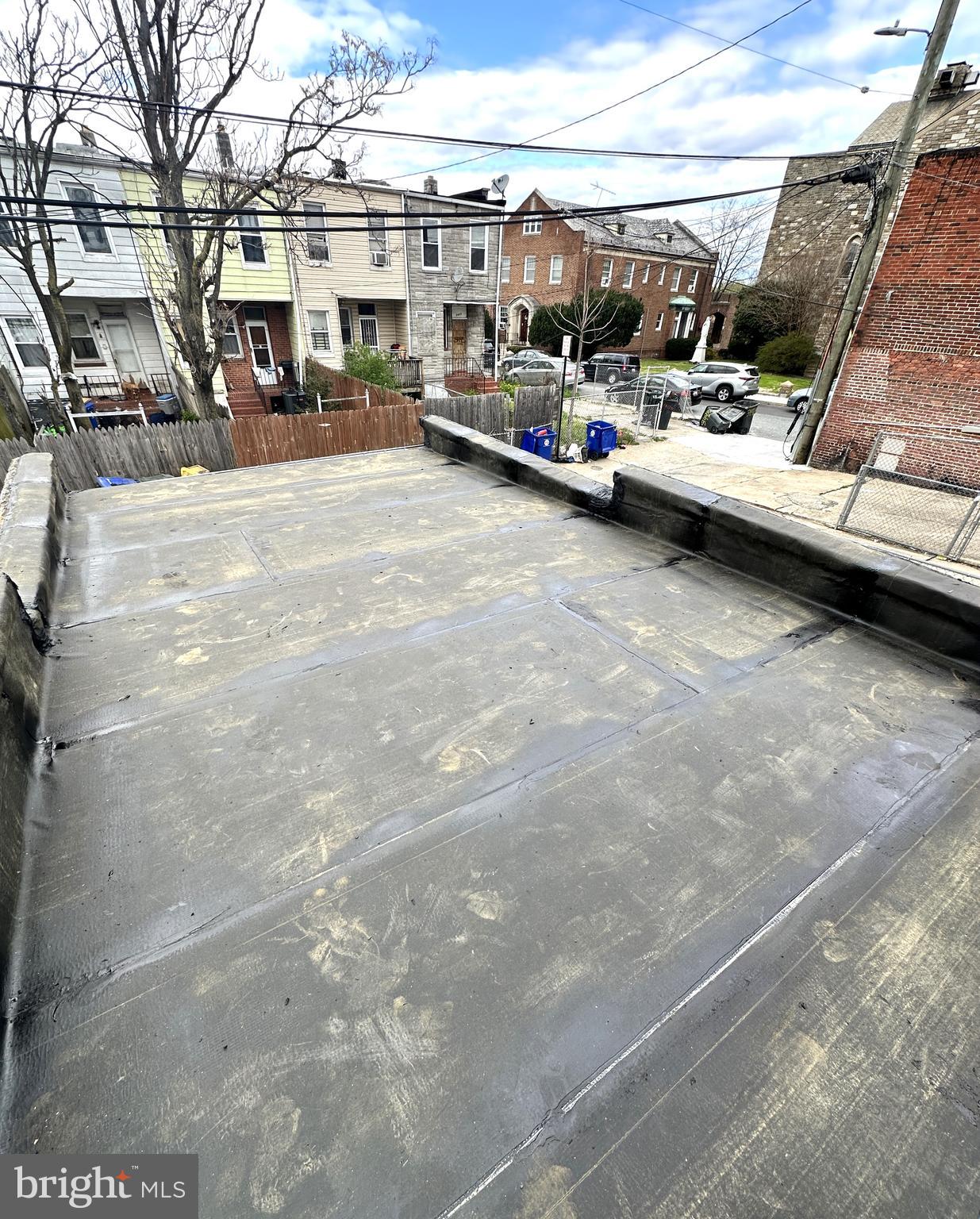 3438 Belair Road Baltimore, MD 21213 - Photo 34 of 36 a view of parking with cars parked