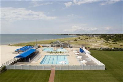 23 Snow Inn Road, Unit 3 Harwich Port, MA 02646 - Photo 2 of 6 a view of a ocean with beach