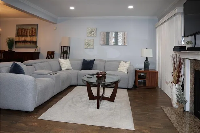 a view of a room with furniture and entryway