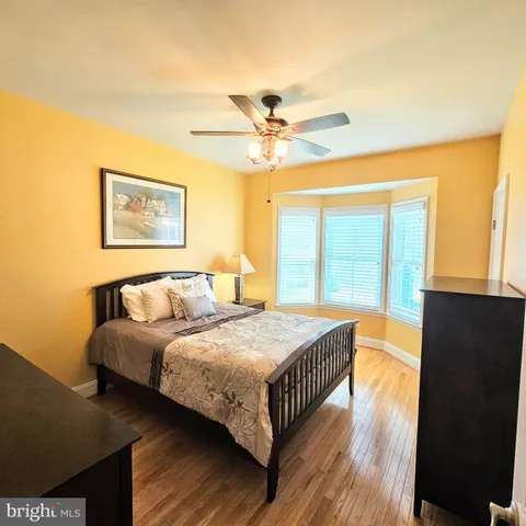 a bathroom with a sink a toilet and a shower