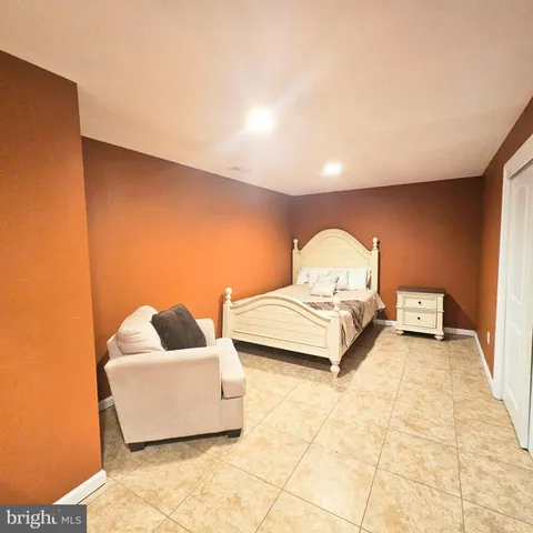 a view of swimming pool with outdoor seating