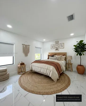 an empty room with white walls and tiles
