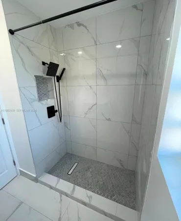 a view of backyard with swimming pool