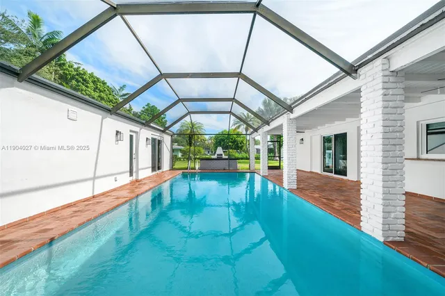 a view of a house with a swimming pool