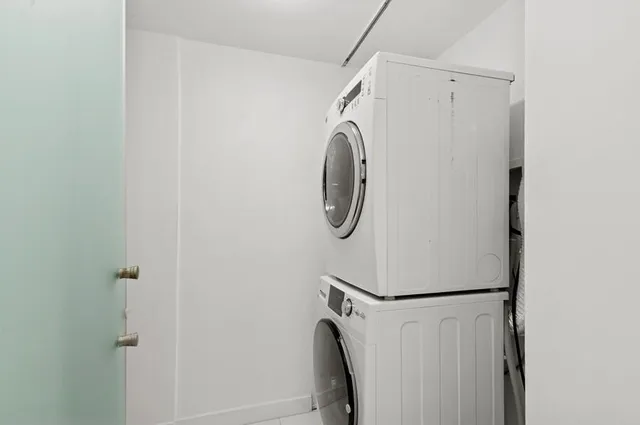 a view of a living room and entryway