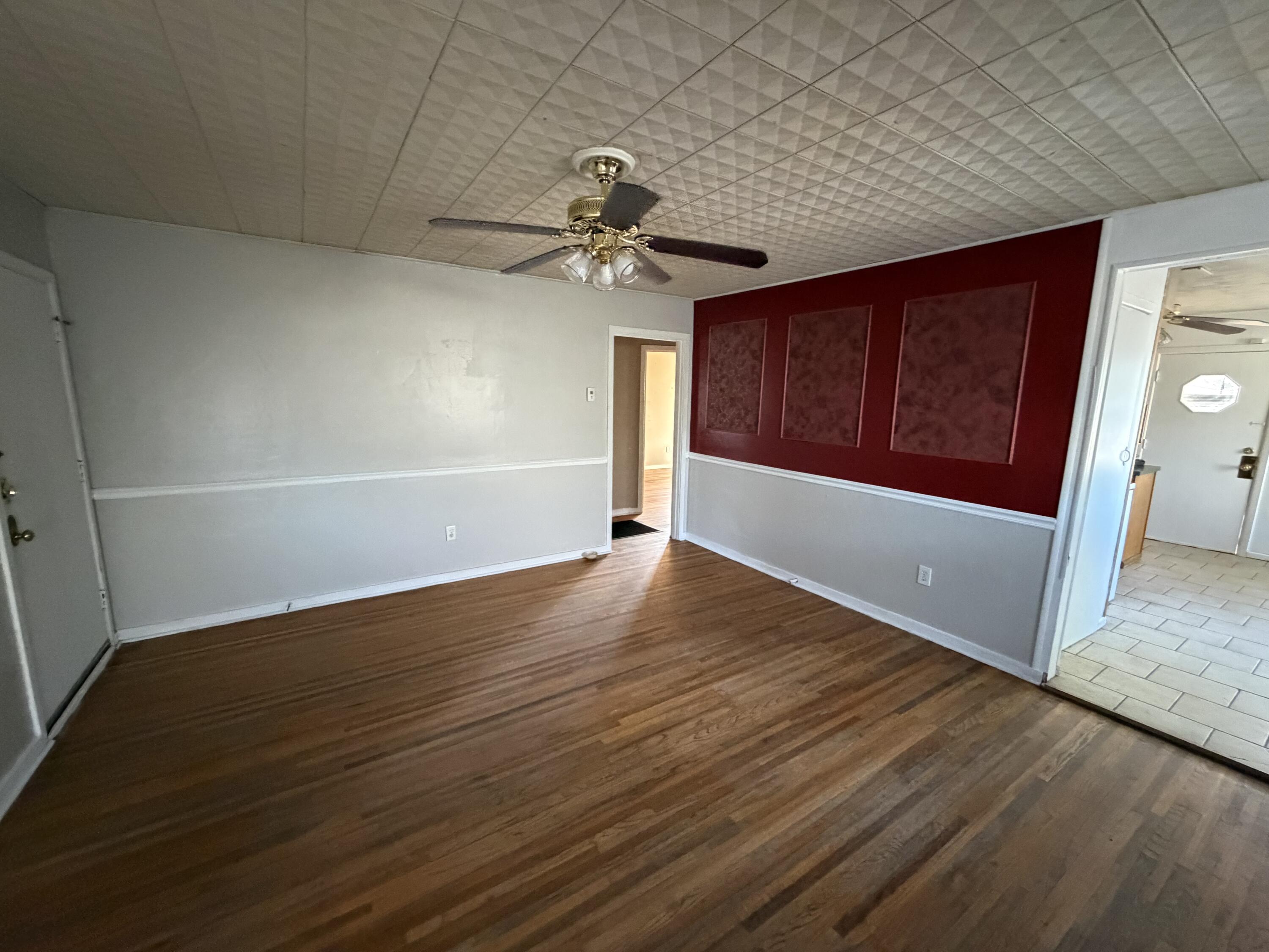 2315 32nd Street Lubbock, TX 79411 - Photo 3 of 9 a view of a livingroom with wooden floor