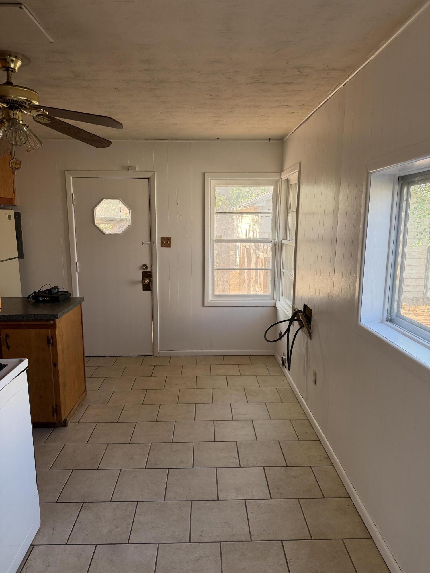 2315 32nd Street Lubbock, TX 79411 - Photo 5 of 9 a view of an empty room with a window