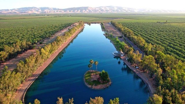 a view of a balcony with lake