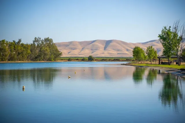 a view of lake with mountain