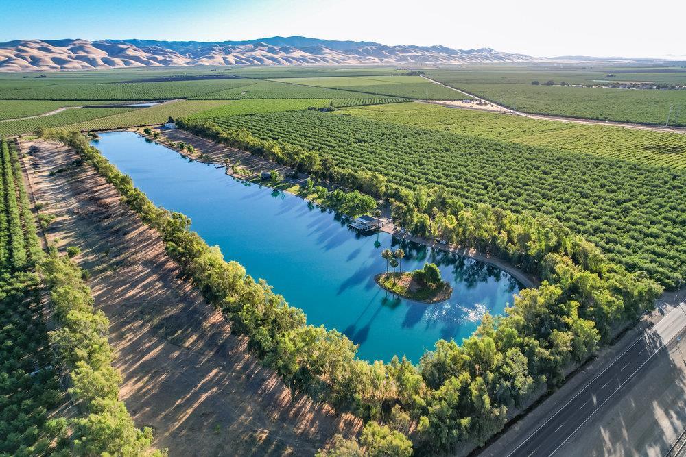 10037 Highway 33 Patterson, CA 95363 - Photo 3 of 19 a view of a lake with a city