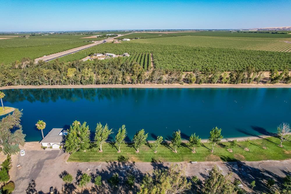 10037 Highway 33 Patterson, CA 95363 - Photo 7 of 19 a view of a lake with a mountain view