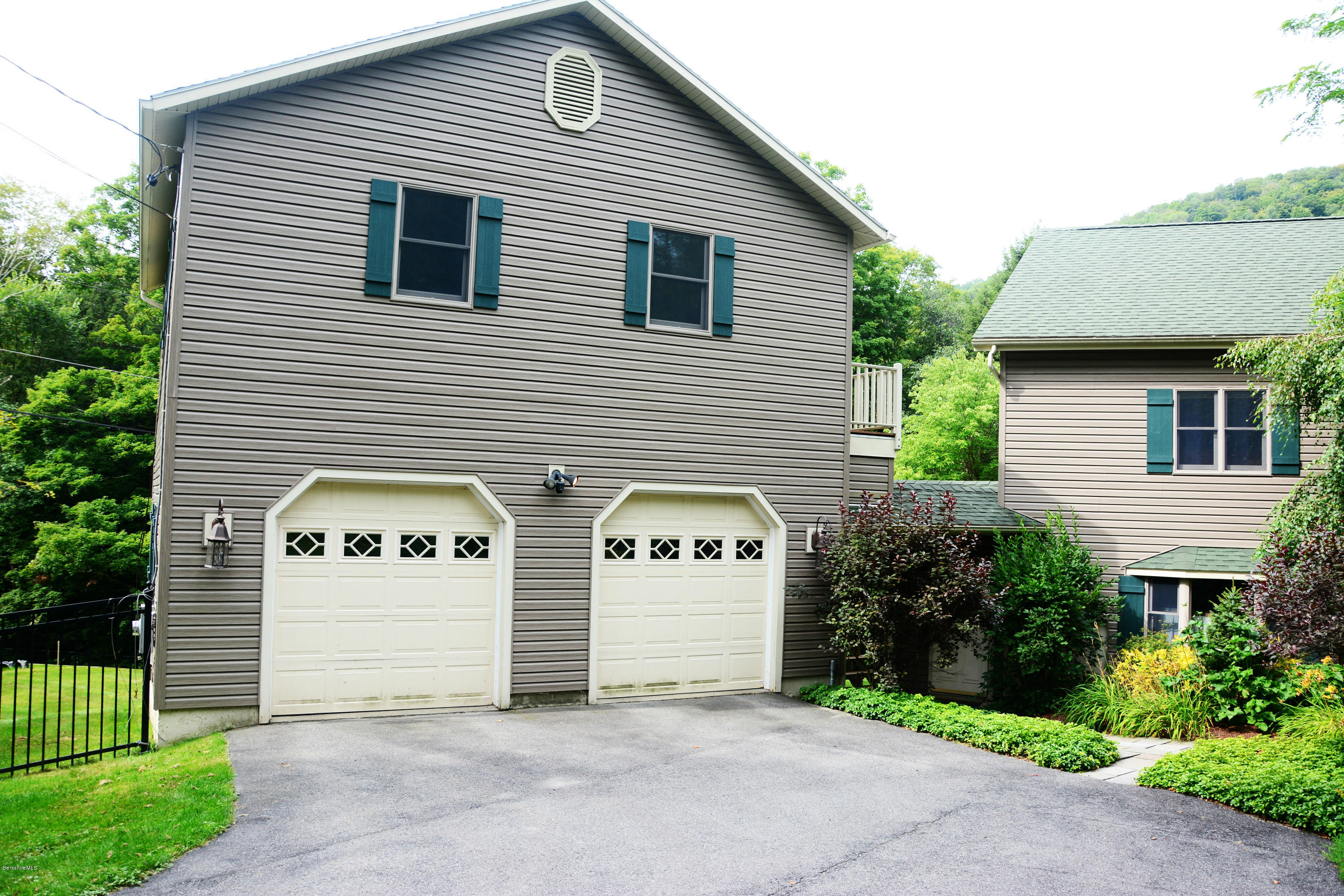 53 Roys Road New Ashford, MA 01237 - Photo 16 of 23 Two Car Garage with (2) finished rooms