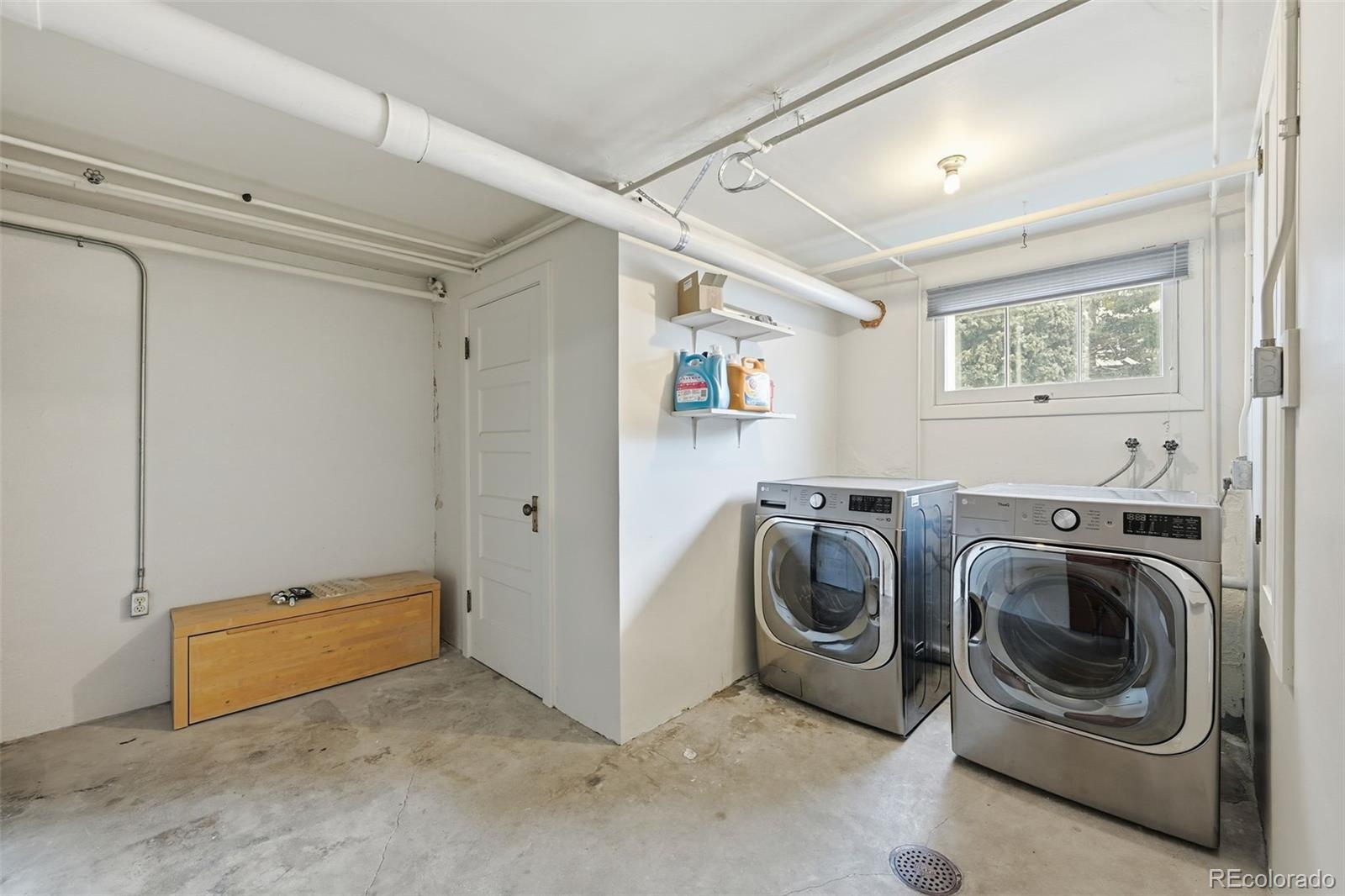 2002 West Ridge Road Littleton, CO 80120 - Photo 30 of 50 a utility room with dryer and washer