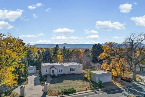 an aerial view of a house with a garden