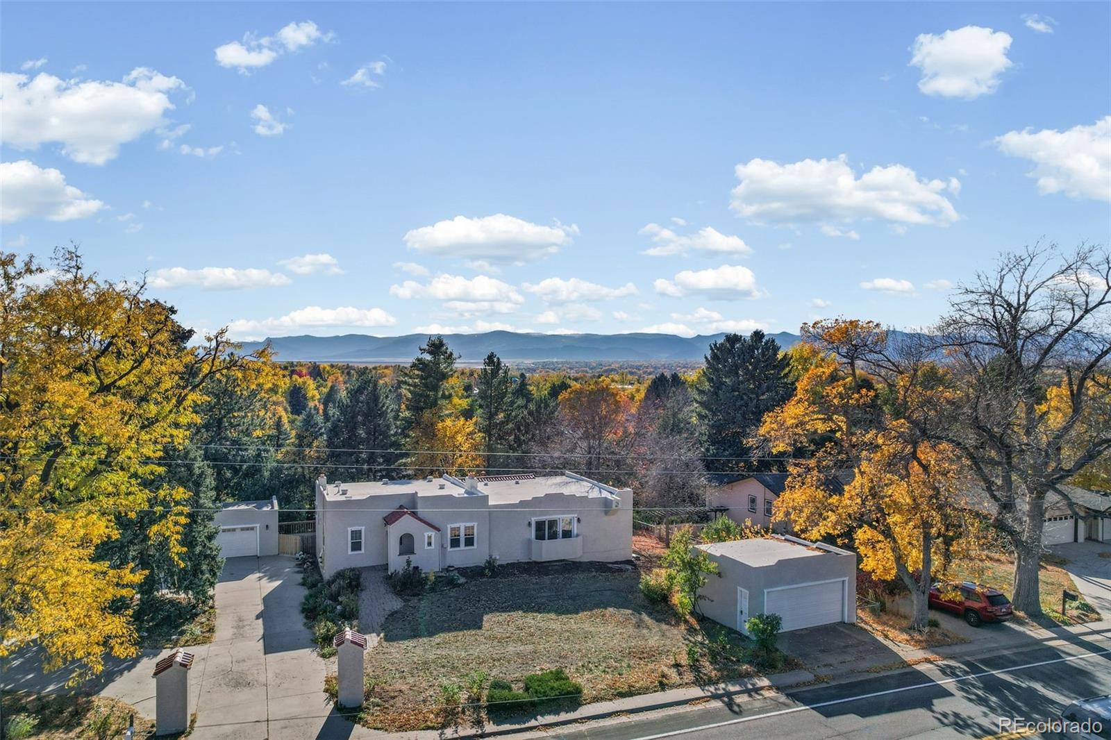 2002 West Ridge Road Littleton, CO 80120 - Photo 3 of 50 an aerial view of a house with a garden