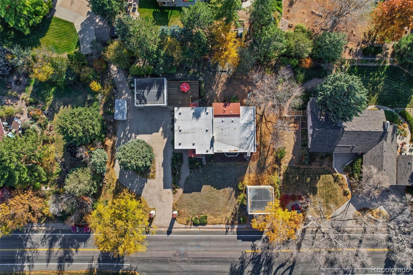 2002 West Ridge Road Littleton, CO 80120 - Photo 44 of 50 an aerial view of residential houses with outdoor space