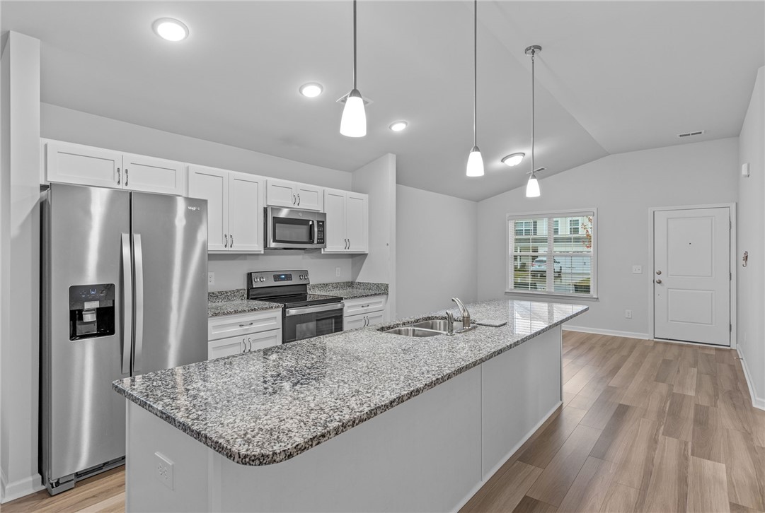 24 Chalet Court Anderson, SC 29621 - Photo 10 of 39 This bright kitchen features stainless steel appliances and abundant counter space.