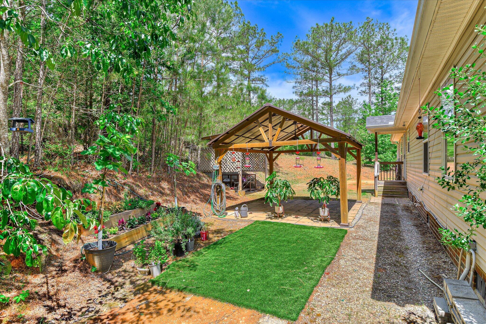 1405 Garrett Road Clarks Hill, SC 29821 - Photo 40 of 51 a pathway of a house with a yard