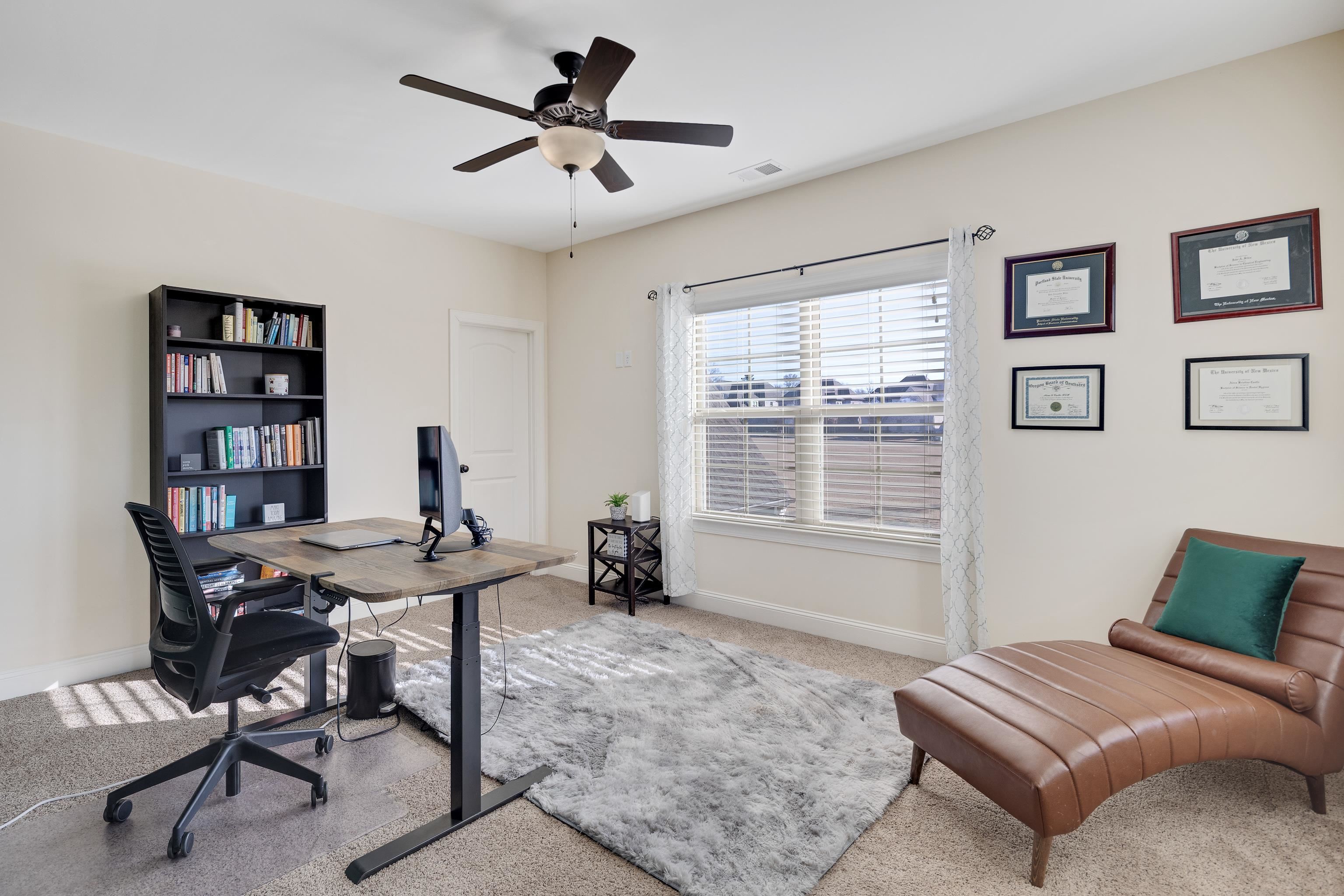 10062 Morning Cross Lane Collierville, TN 38017 - Photo 25 of 39 a view of a livingroom with workspace and a window